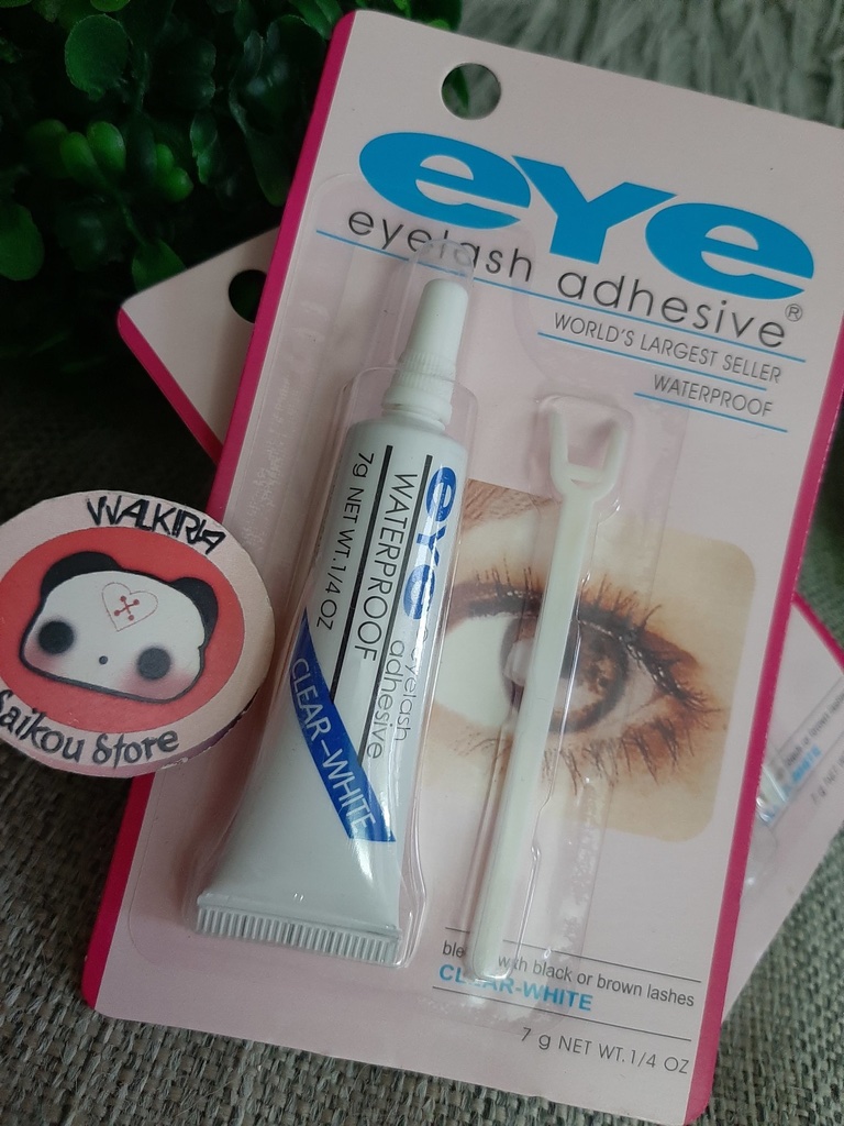 Eye eyelash adhesive